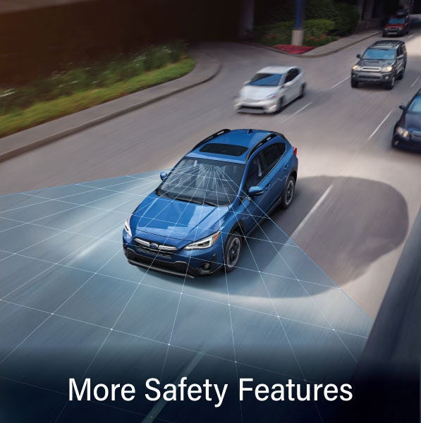 A Subaru Crosstrek in blue with the words &ldquo;More Safety Features&ldquo;. | Tonkin Subaru in The Dalles OR